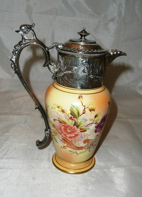 Lot 153 - Carlton ware jug with plated mount