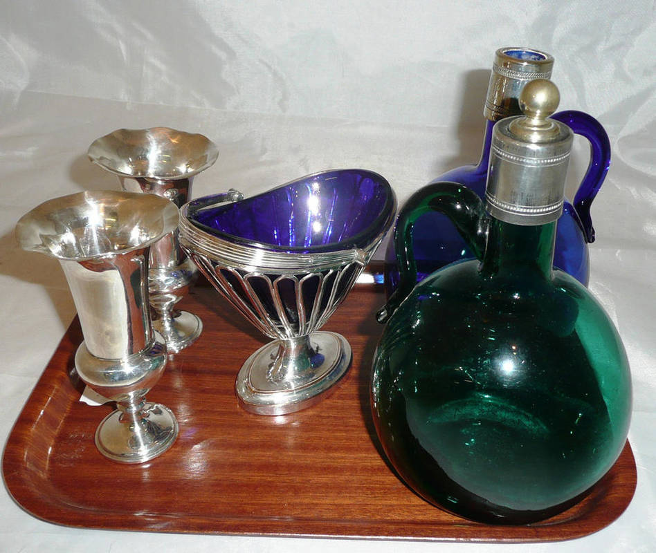 Lot 163 - Two coloured glass decanters, with white metal mounts, plated sugar basket and a pair of silver...
