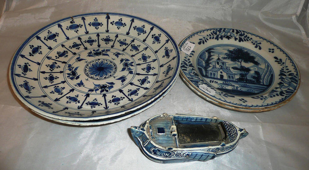 Lot 170 - Four Delft blue and white plates, and a Delft ink stand in the form of a boat