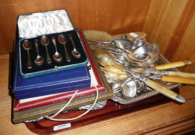 Lot 204 - Three piece silver mounted dressing table set, two cased silver teaspoons, three photos in...