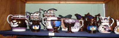 Lot 262 - Thirteen jugs and two goblets