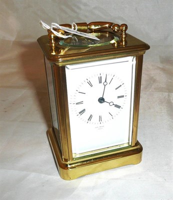 Lot 276 - A brass carriage clock (a.f.) and key