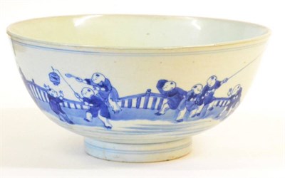 Lot 79 - A Chinese Porcelain Bowl, 18th century, painted in underglaze blue with children playing in a...