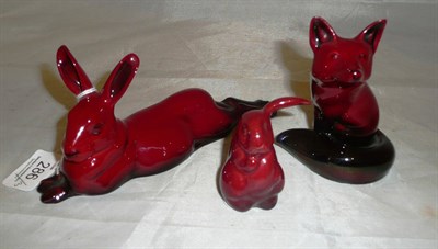 Lot 286 - Three Royal Doulton Flambe animals of two rabbits and a fox