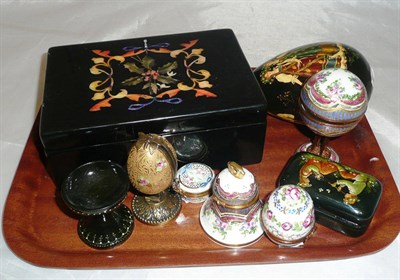 Lot 295 - Russian egg on stand, Russian box, five trinket boxes/eggs and a box