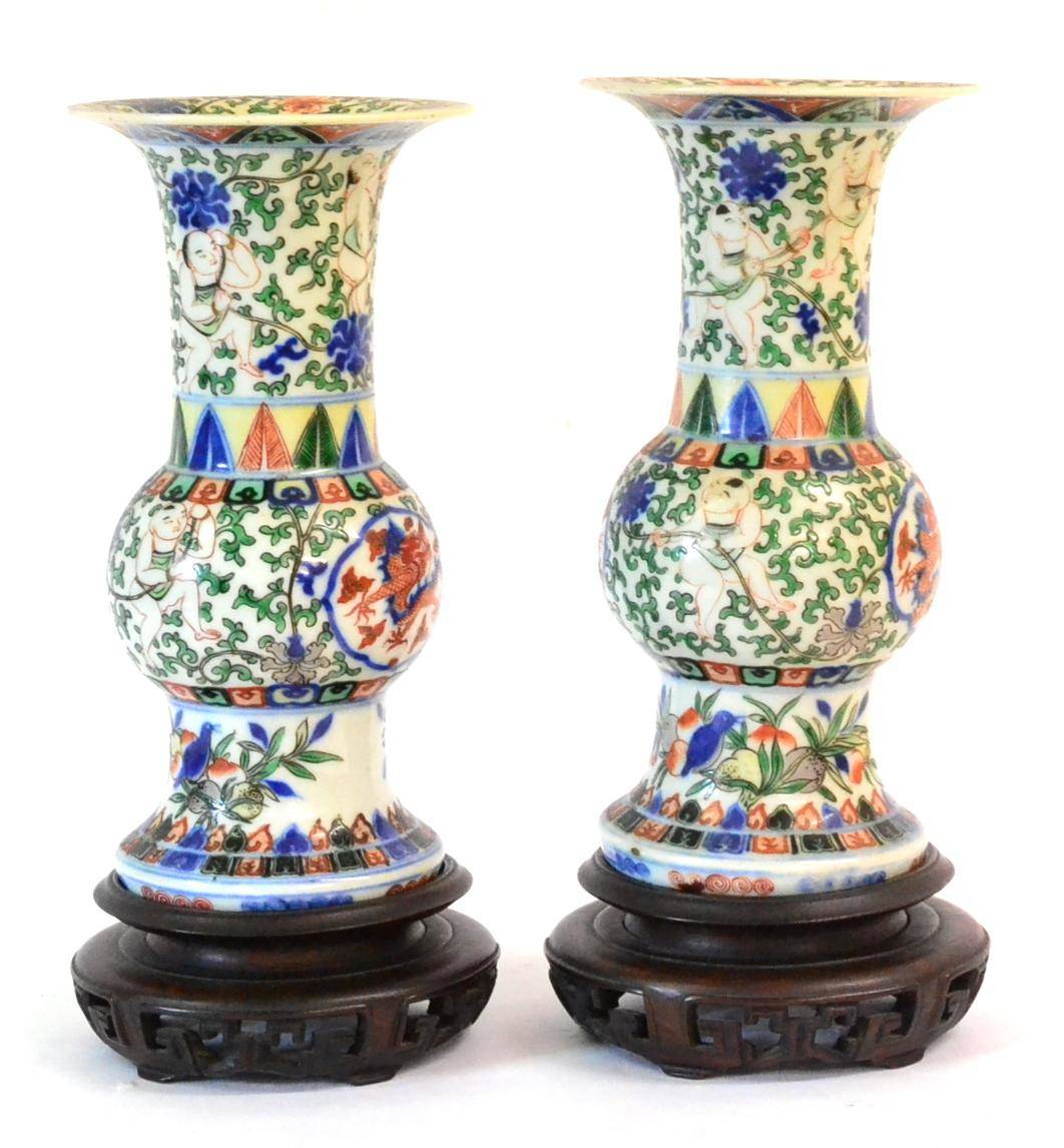 Lot 81 - A Pair of Chinese Wucai Porcelain Vases, Wanli reign marks but probably later, painted with dragons