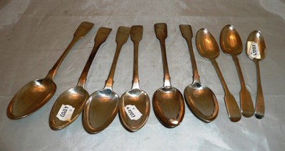 Lot 311 - Six silver fiddle pattern tablespoons, M.R.A. and three silver dessert spoons, 18.5oz