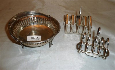 Lot 320 - Two silver toast racks and a silver bonbon dish, approximately 8oz