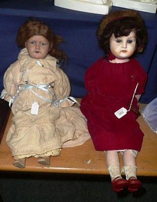 Lot 350 - English bisque shoulder head doll, with fixed blue eyes, open mouth, original wig, on a fabric...