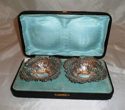 Lot 354 - A pair of pierced silver bonbon dishes, cased