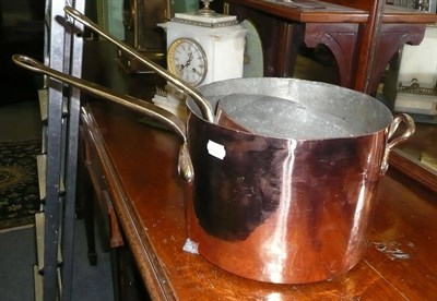 Lot 381 - Two large copper/brass sauce pans