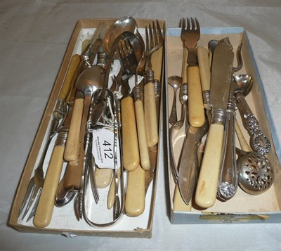 Lot 412 - Three pairs of silver sugar nips and a quantity of flatware