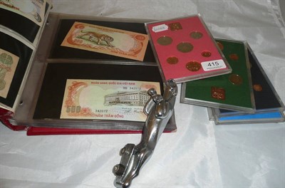 Lot 415 - Banknote album with notes from around the world, five plastic cases of coins and a chrome...