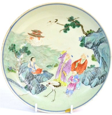 Lot 92 - A Chinese Famille Rose Saucer Dish, 18th century, decorated in typical palette with figures and...