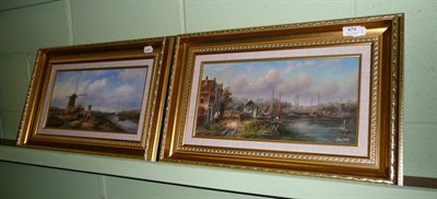 Lot 474 - Pair of oil paintings on panel by Johnny Gustin, 'Dutch canal scenes with figures and boats'