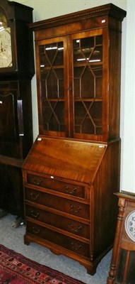 Lot 483 - Reproduction mahogany bureau bookcase