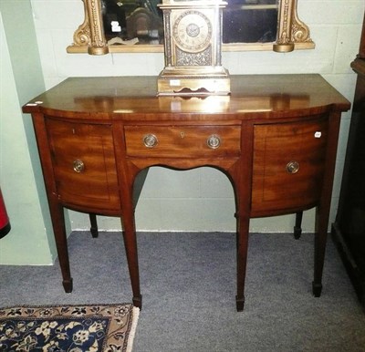 Lot 486 - Late George III mahogany bow fronted sideboard