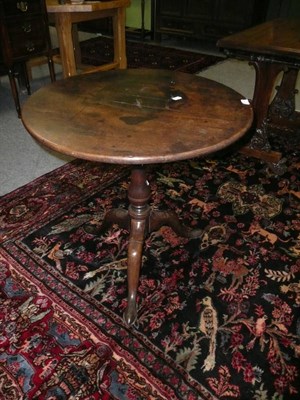 Lot 534 - George III mahogany bird cage action tripod table