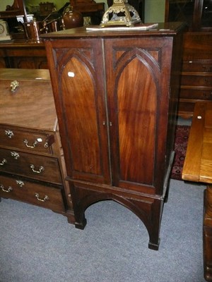 Lot 542 - Mahogany Gothic style double door cabinet