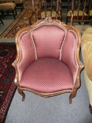 Lot 555 - Beech framed tub armchair