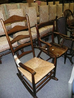 Lot 559 - Rocking chair with rush seat and a kitchen armchair