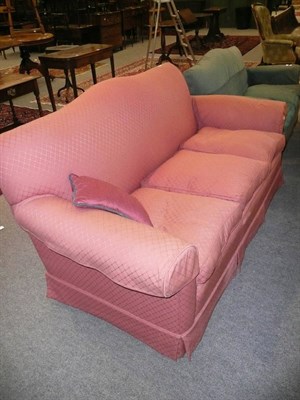 Lot 567 - Pink sofa