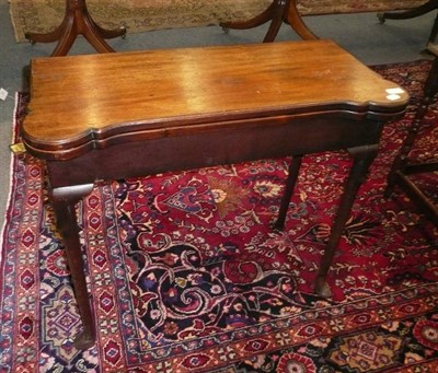 Lot 571 - George III mahogany games table