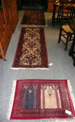 Lot 580 - Narrow Hamadan runner, Tekke rug, Bukhara rug and another (4)