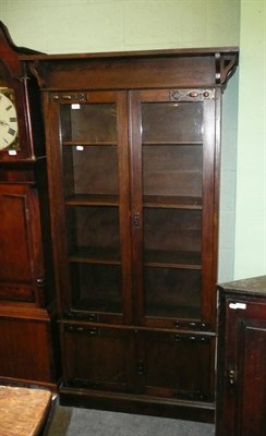 Lot 608 - Edwardian oak glazed bookcase