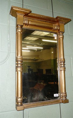 Lot 616 - An early 19th century gilt wall mirror