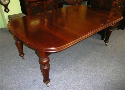 Lot 627 - Victorian mahogany extending dining table with handle and two leaves