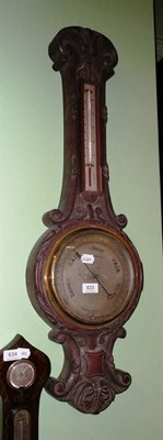 Lot 633 - A Victorian carved oak aneroid barometer by Negretti & Zambra