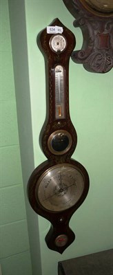 Lot 634 - A 19th century rosewood simulated barometer