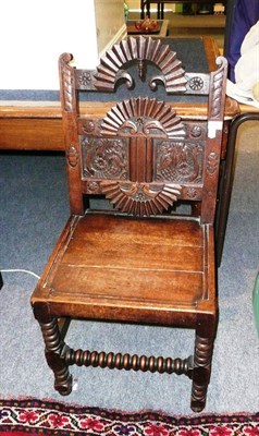 Lot 636 - A Victorian carved oak side chair