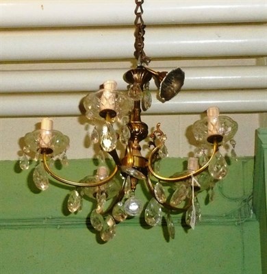 Lot 640 - Gilt and glass five branch chandelier