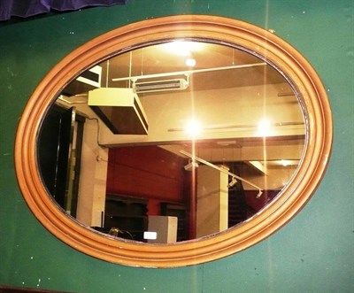 Lot 652 - Oval gilt wall mirror