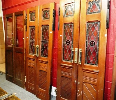 Lot 663 - Pair of pitch pine doors with leaded glass panels, another similar pair and a pair of glazed doors