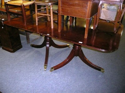 Lot 672 - Reproduction twin pillar dining table