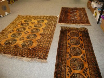 Lot 690 - Afghan carpet, Afghan runner and rug (3)