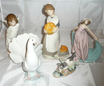 Lot 4 - Lladro figures - 'Angel', 'Kitty Confrontation', 'Doue', 'Dancing Lady' and 'Girl with Pumpkin' (5)