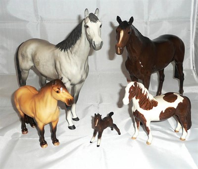 Lot 5 - Two large Beswick horses, two others and a foal