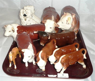 Lot 9 - A Beswick Hereford Bull, model 1363a, a Hereford Cow, model 1360, two Old English Dogs, a foal, and