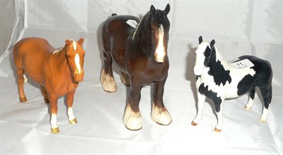 Lot 11 - A Beswick Piebald horse, palomino horse and shire mare (3)