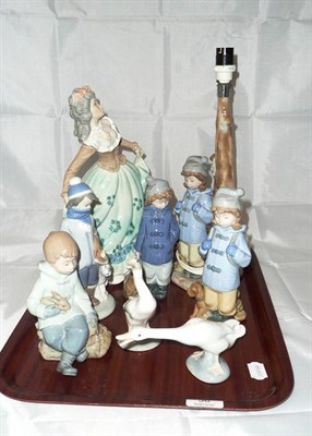 Lot 36 - Two Lladro geese, Lladro figure of a young boy, Nao table lamp, three figures and a large...