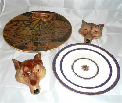 Lot 41 - A Poole charger decorated with an owl, a Crown Derby plate and two fox wall masks, a plated...