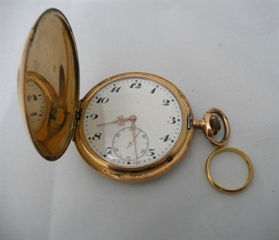 Lot 64 - A full hunter cased pocket watch stamped 14k and a gold ring stamped 900