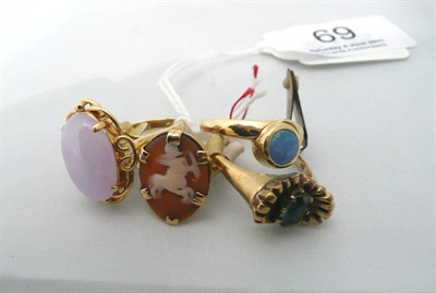 Lot 69 - A 14ct gold opal triplet ring, a cameo ring and two other rings (4)