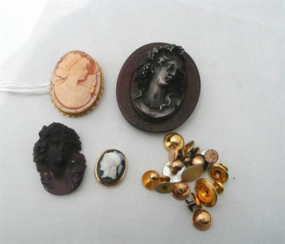 Lot 72 - A cameo brooch, a cameo carving, two other depictions of maiden's heads, and assorted dress...