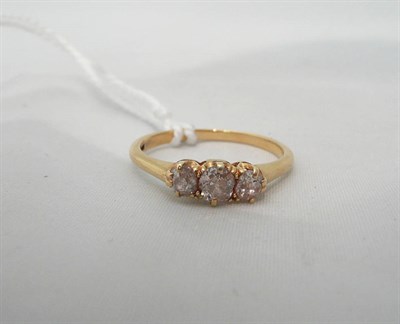 Lot 76 - An old cut diamond three stone ring