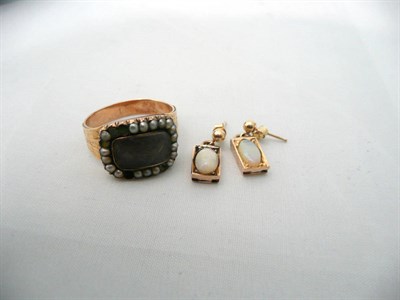 Lot 79 - A mourning ring and a pair of opal earrings